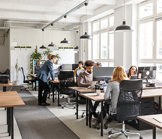 people working in an open plan office
