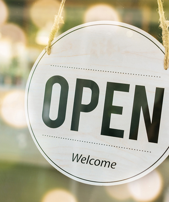 open sign in store window